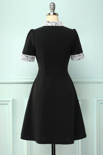 Vestido de lapela preto com bolsos
